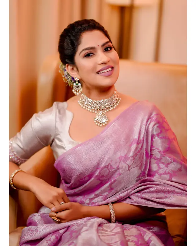 Engagement look: lilac silk saree, diamond necklace and soft glam makeup — makeup by Popyz Beauty Lounge, Kozhikode